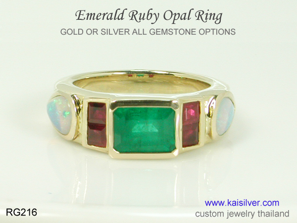 emerald ring with many gemstones